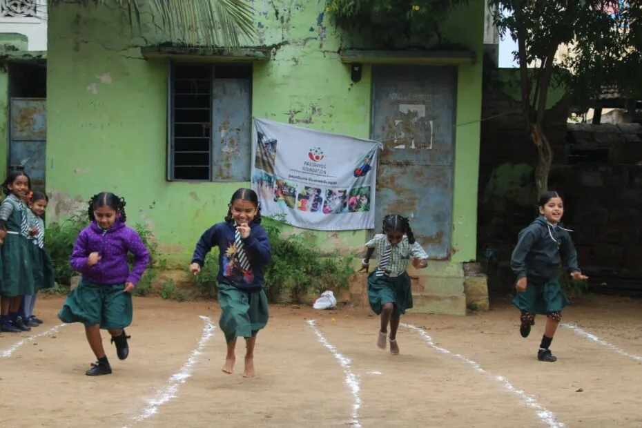 NavSahyog children with the Foundation's logo — Life skills to Livelihood